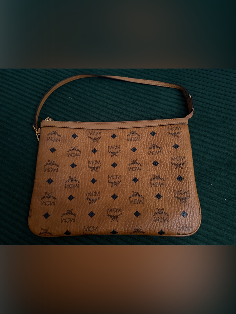 MCM Liz Visetos Monogram Crossbody Pouch with Black Accents in Cognac.